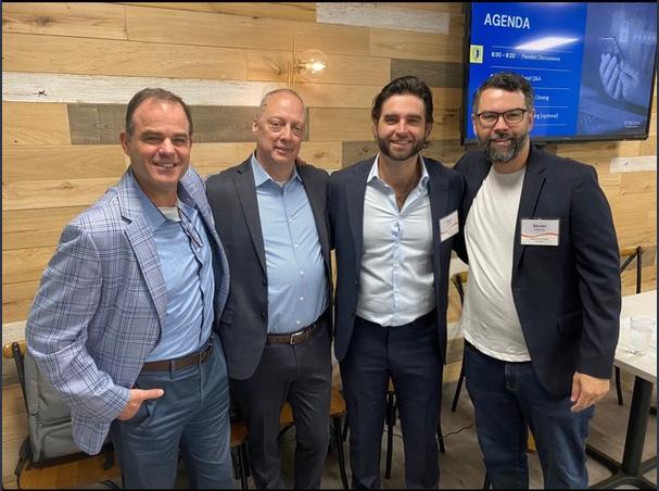 Ryan networking at a cyber insurance industry event